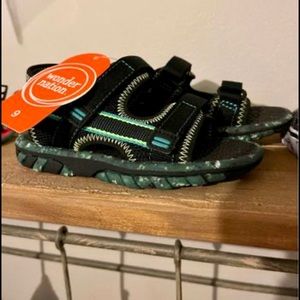New toddler sandles with tags (never worn). Size 9.